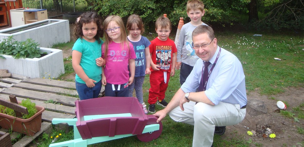 Wheel-barrow planter is blooming marvellous for kids