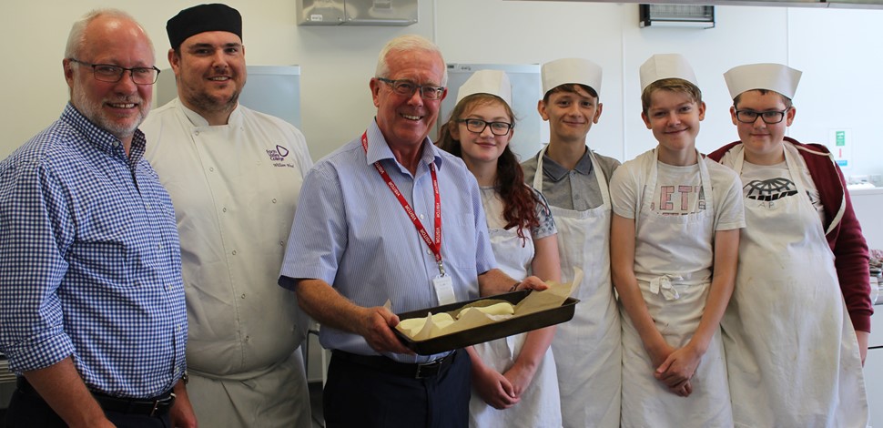 Youngsters learn cooking and other traditional skills
