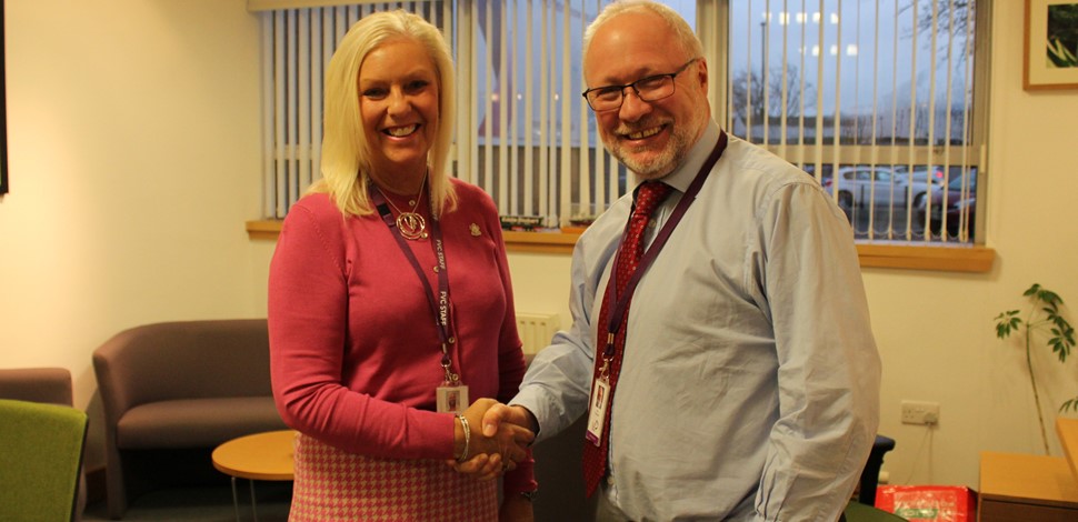 Staff reach long service milestones within weeks of each other