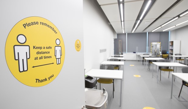 Safety measure signage in commercial classrooms
