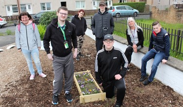 Workstart students really dig Westfield Park Garden