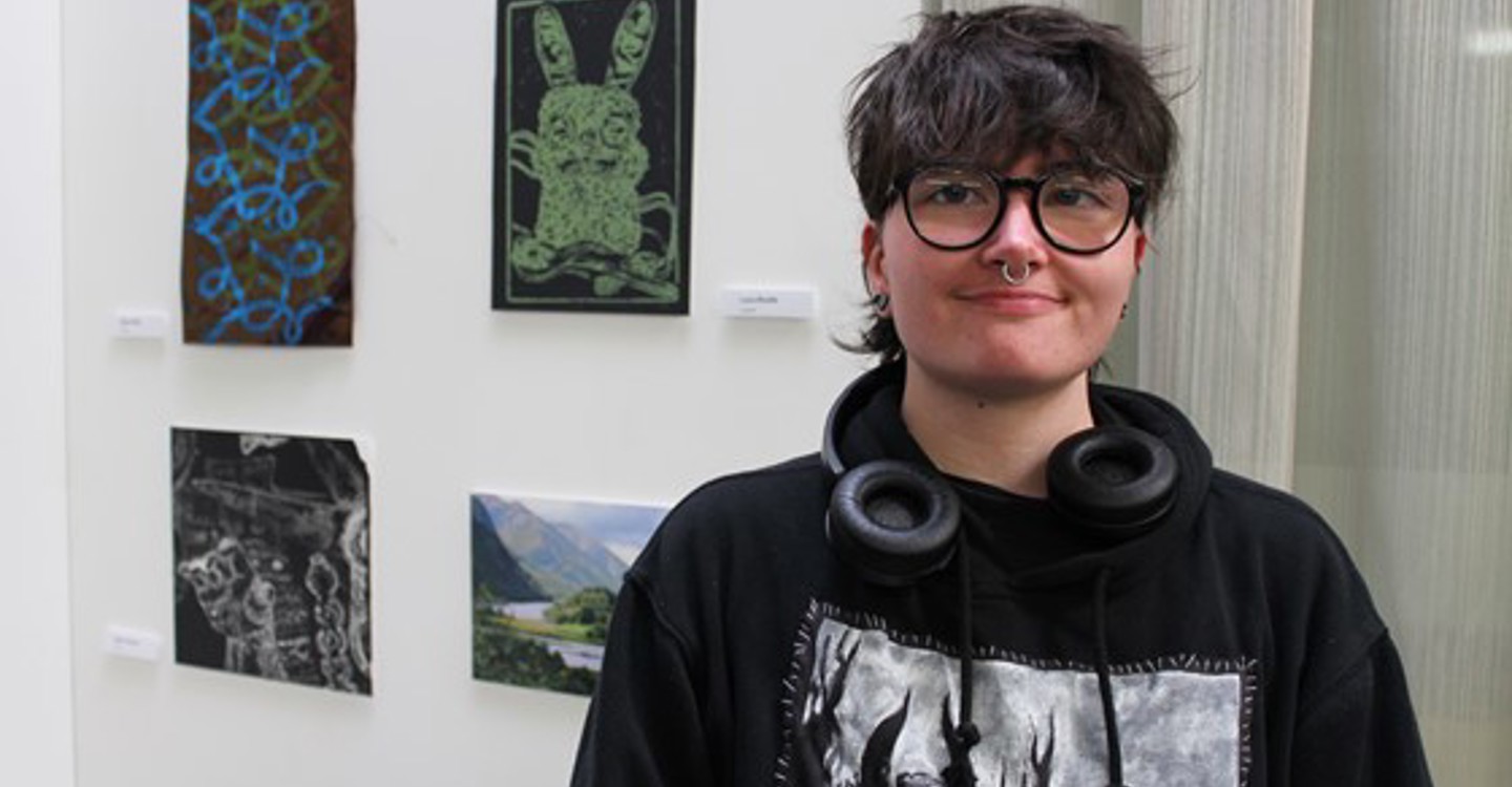 Luca Brydie With His Artwork