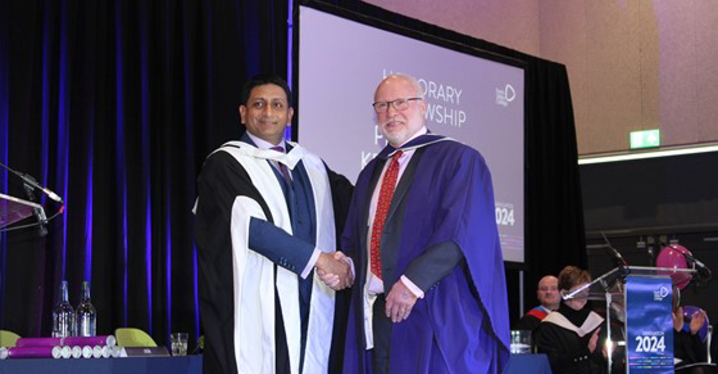 Abhishek Agarwall Presents Ken Thomson With His Fellowship Award