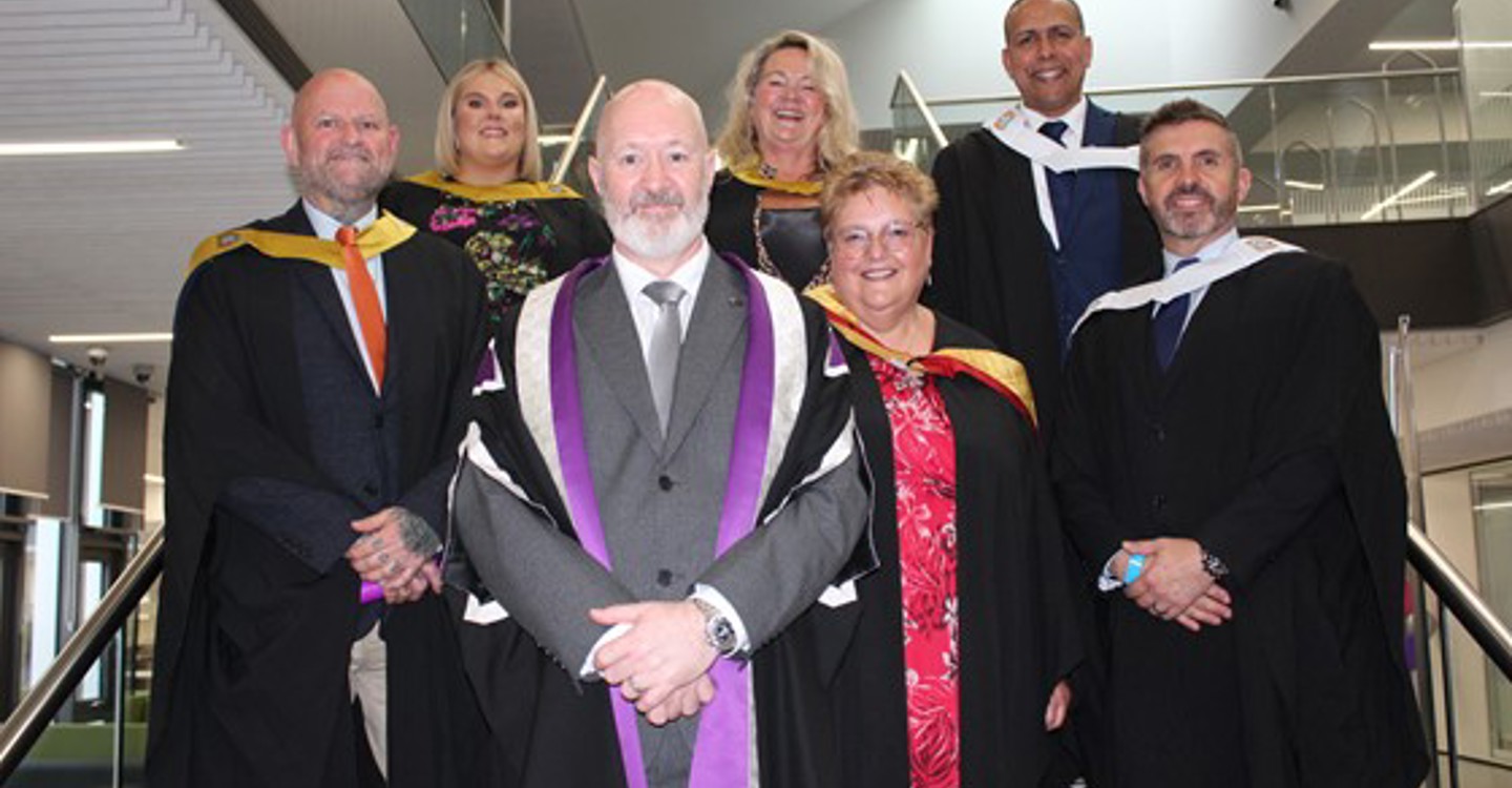 Kenny And Graduating Staff