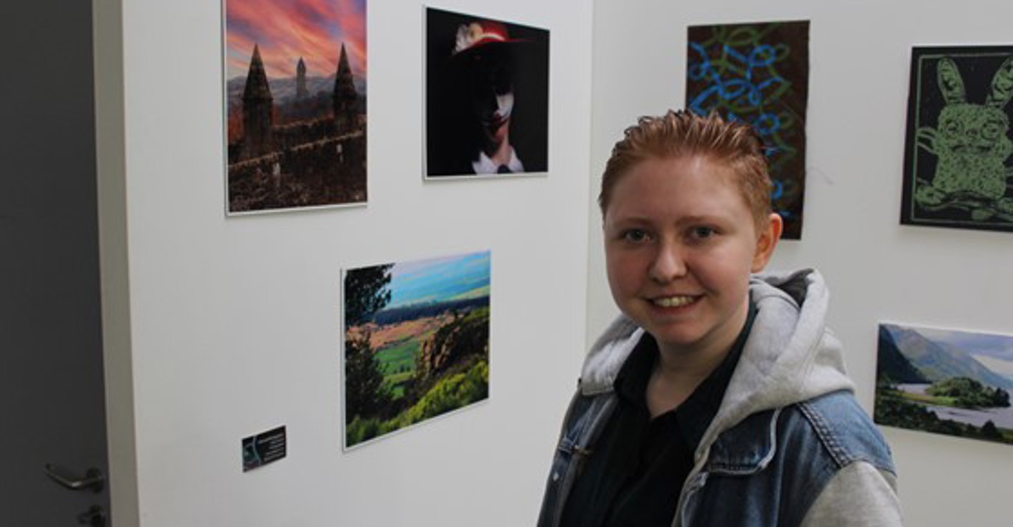 Cailey Devine With Her Artwork